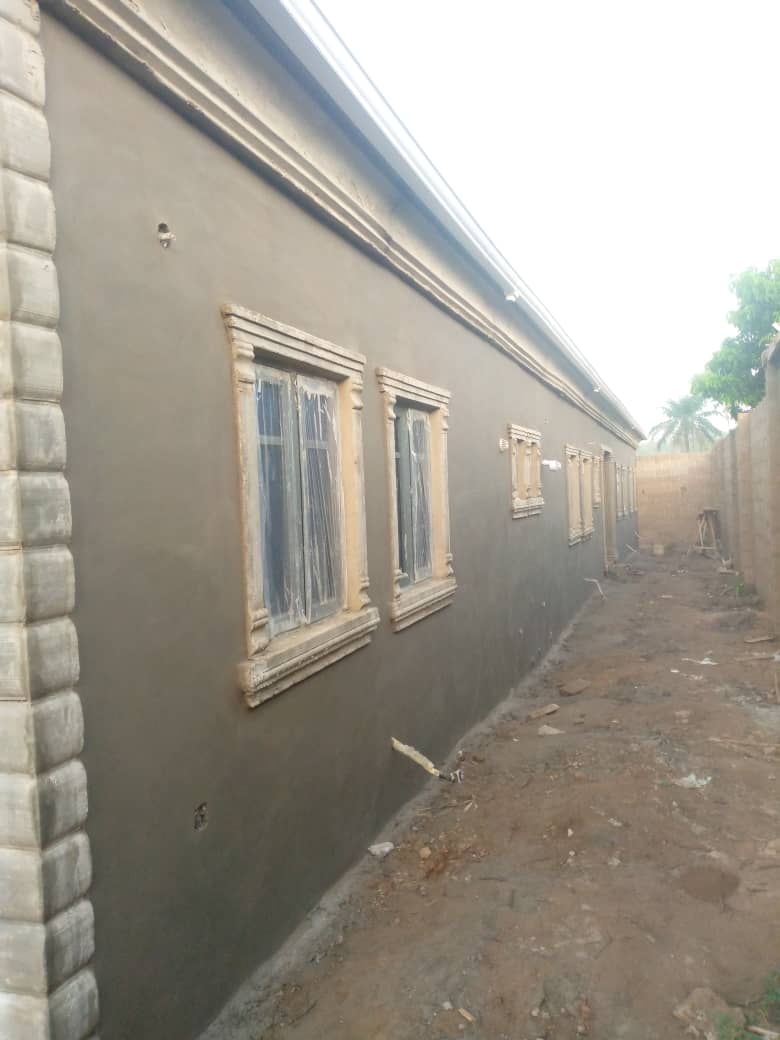 Exterior wall screeding and window moulding trim work