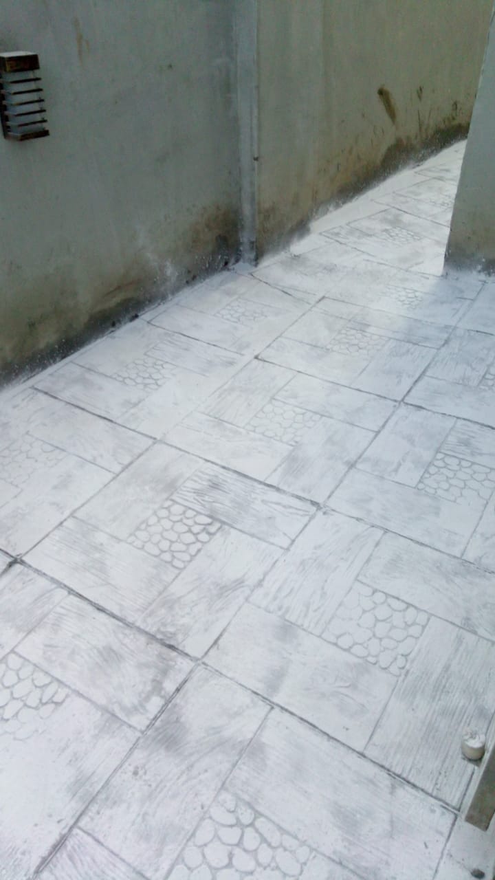 Custom stamped concrete pattern layout prior to sealing